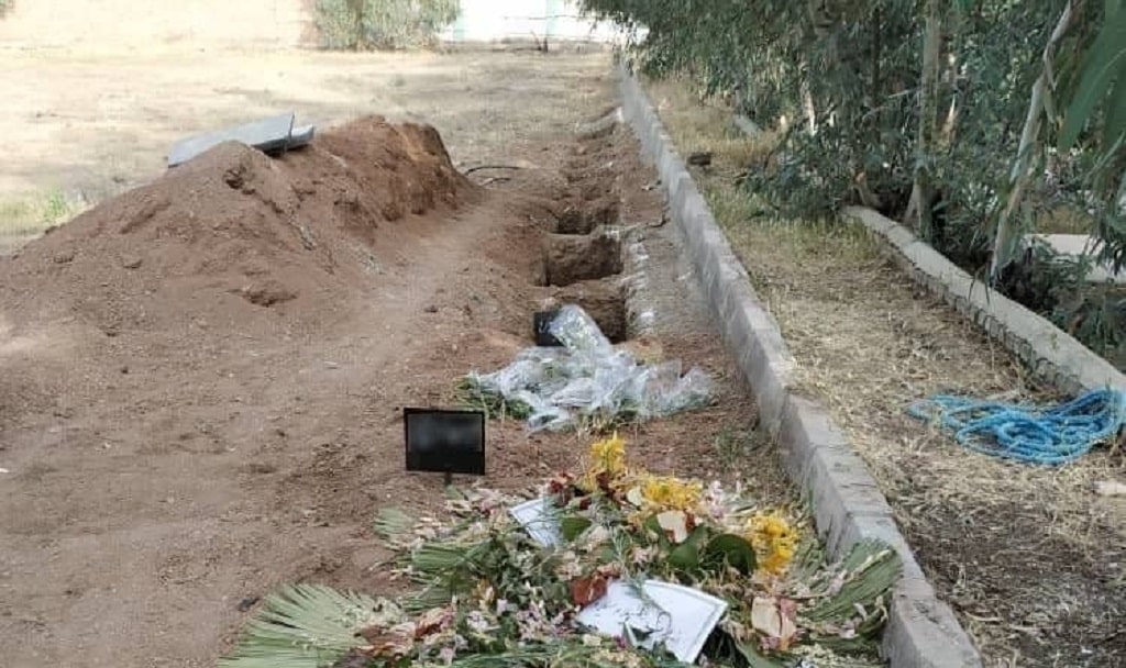 Photo of new graves over mass grave in Khavaran, Iran